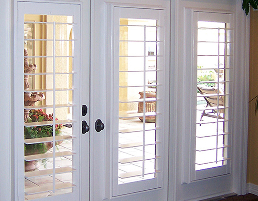 white plantation shutters for french doors Austin