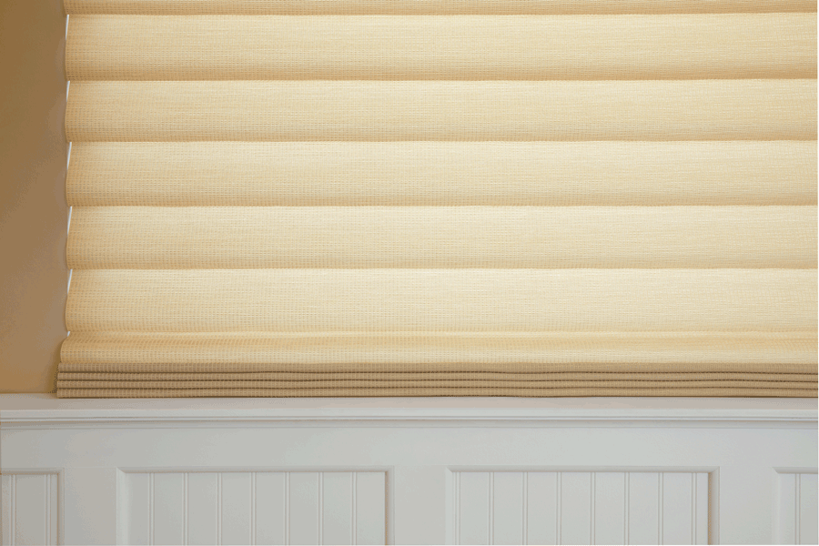 Close up of modern roman shades used to cut the glare