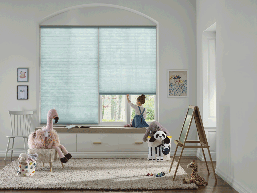 Children playing in room in Austin home with cordless blinds.