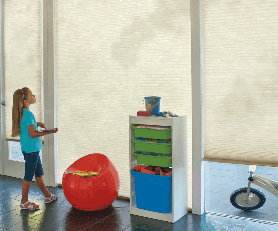 Motorized shades in this Austin, Texas home are great for child safety.