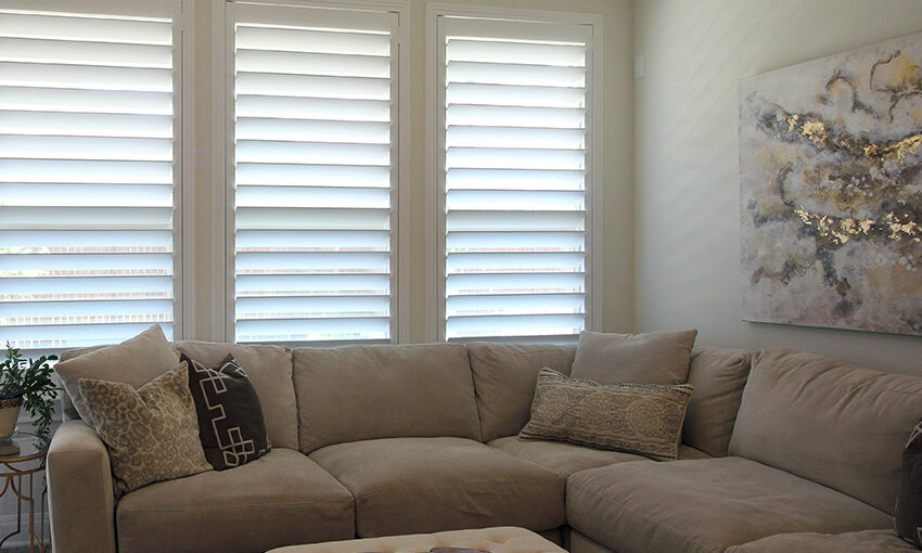 white plantation shutters gold deorated home Austin TX