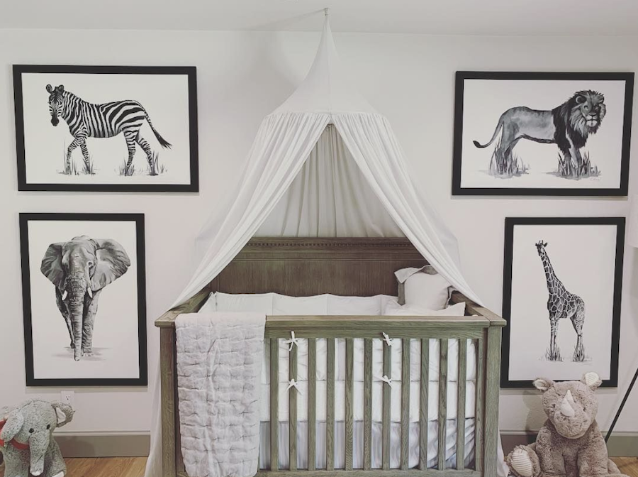 nursery with safari animal prints framed in the color black