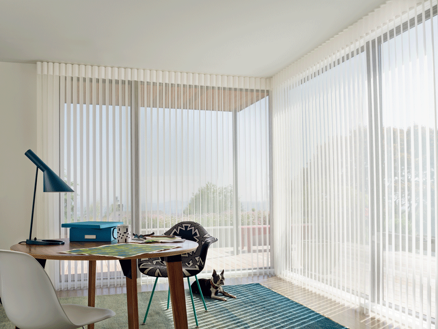 Bring in the perfect amount of light into your home office with luminette view through sheer vertical shades.