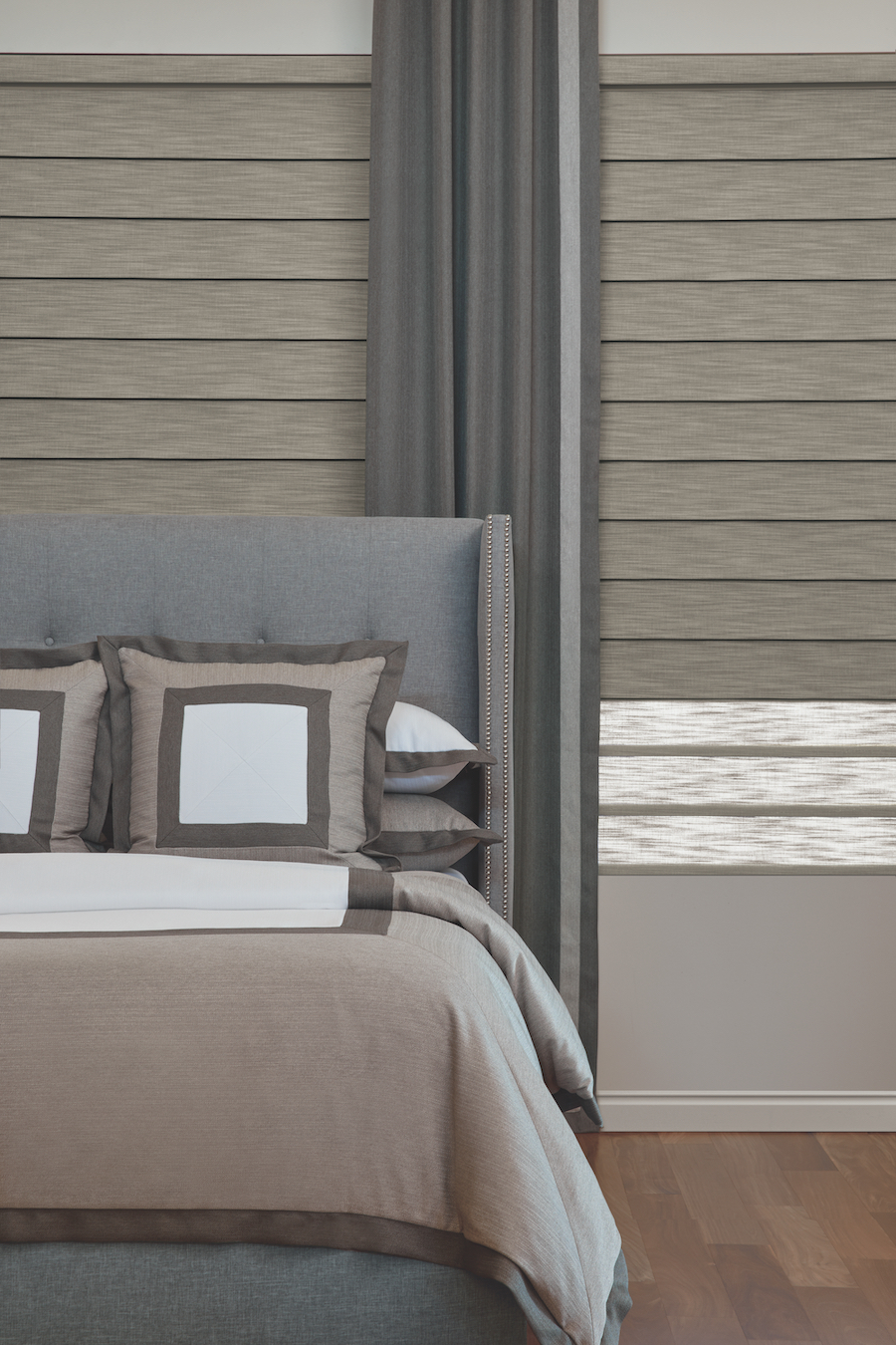 Vignette Roman Shades by Hunter Douglas in bedroom.