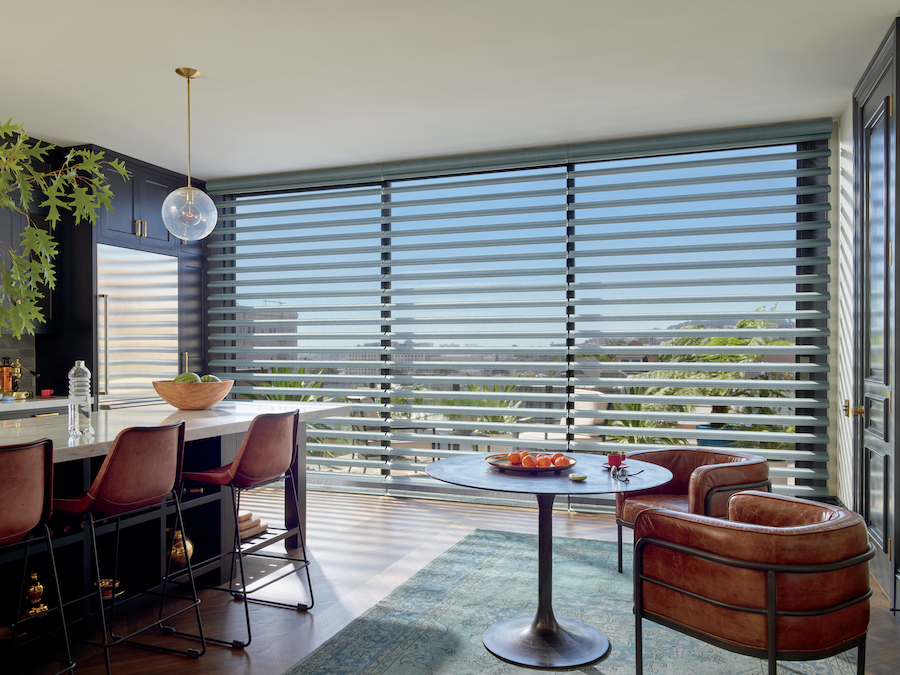 open concept living space Multiple Pirouette® window shades can cross a wall of windows seamlessly