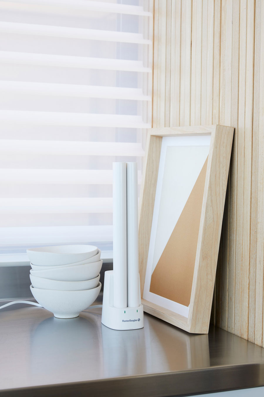 PowerView-Dual-Rechargeable-Battery-Motorized-Shades-Austin-Window-Fashions Hunter Douglas rechargeable battery wands in a dual charging station