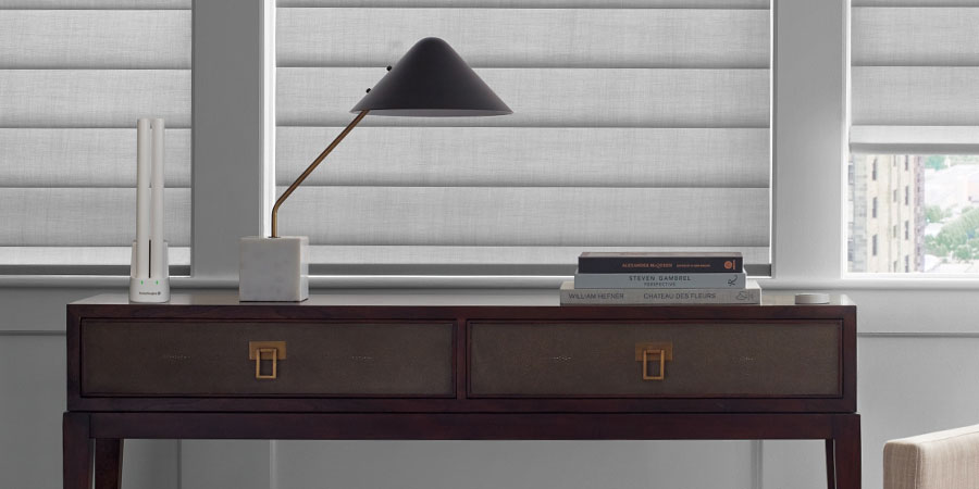 Hunter Douglas rechargeable battery wands connected to a charging station