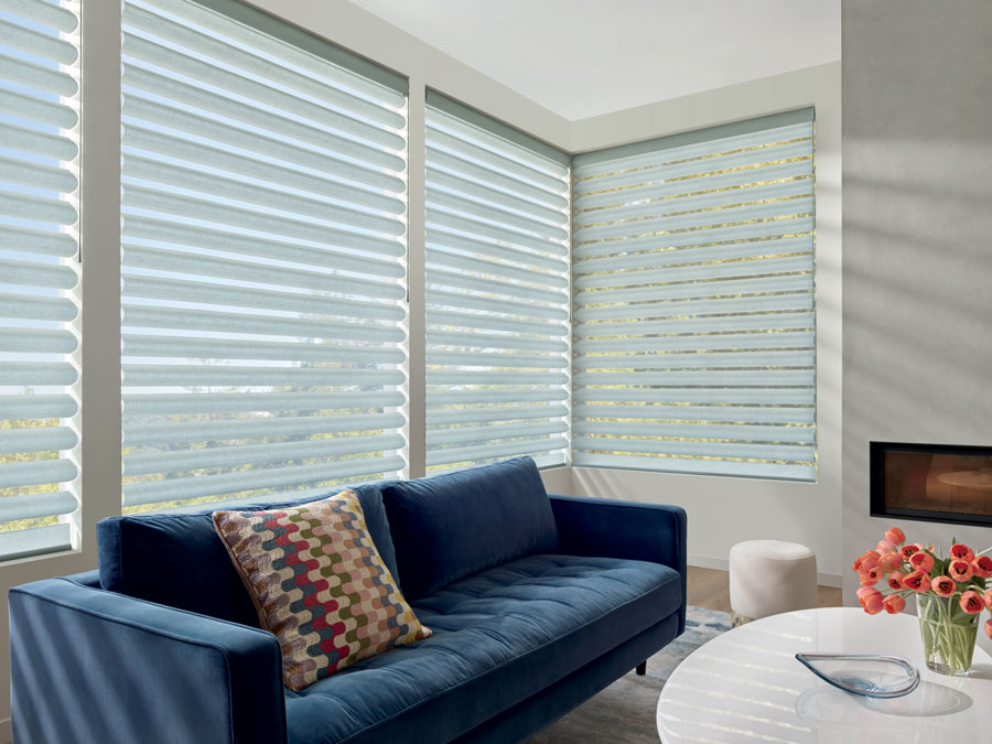 corner windows in living room with sheer shades in Austin TX