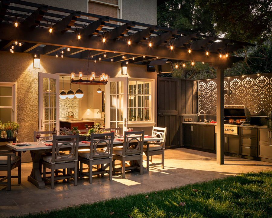 outdoor patio area with pergola for top design features