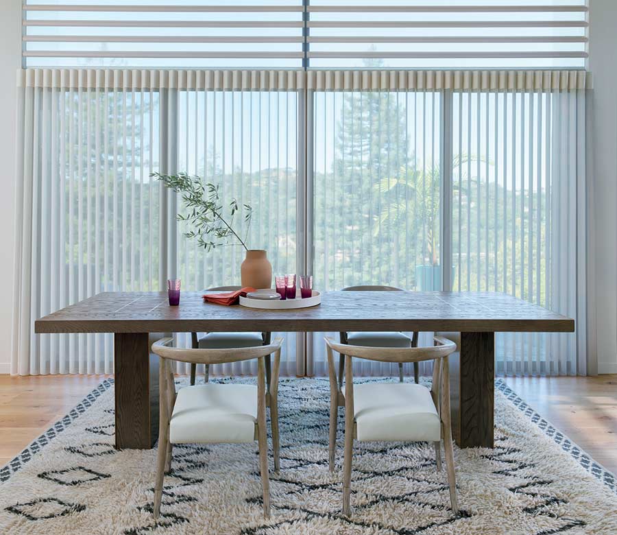 Modern dining room with floor to ceiling privacy sheers in the Austin 78738