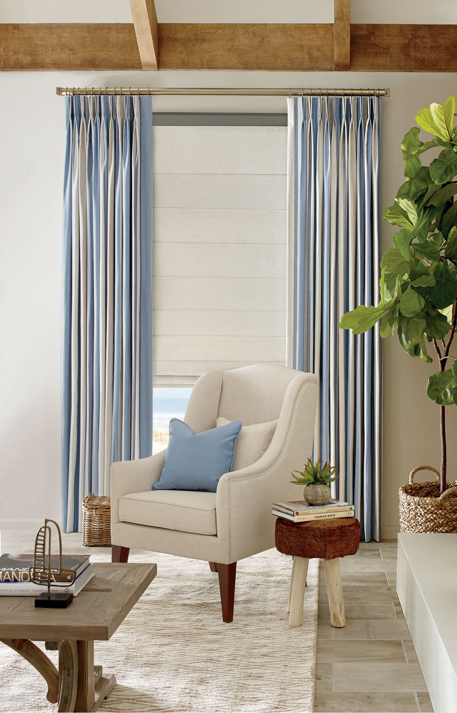 blue and white striped draperies in coastal inspired living room