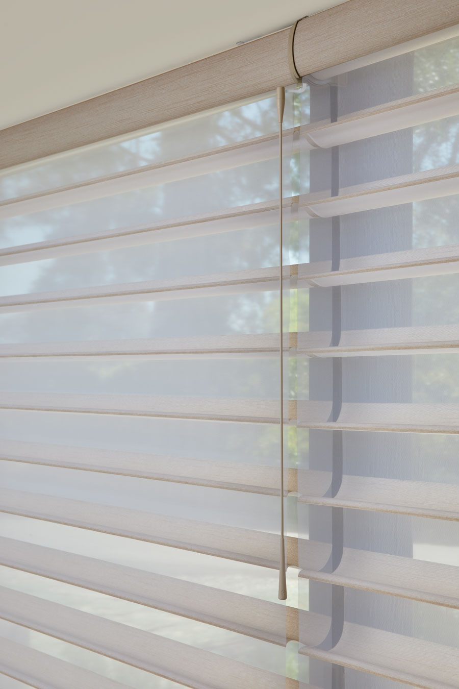 Close up of Silhouette® Shades with SoftTouch® Motorization in Austin Tx home