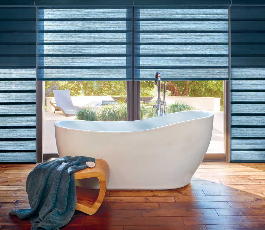 blue roman shades in an Austin TX master bathroom