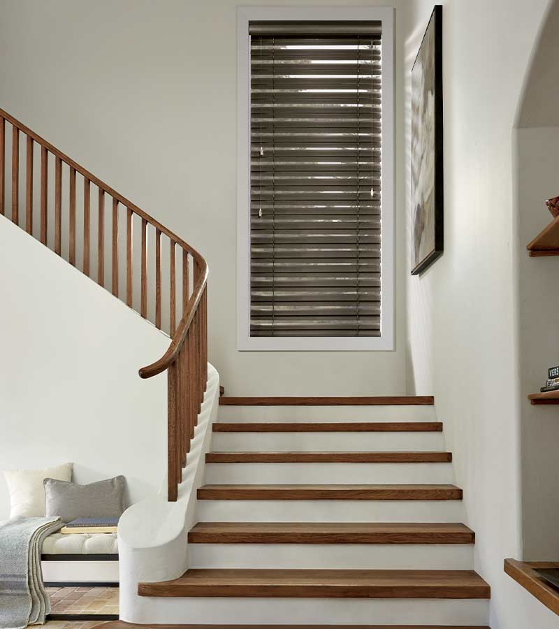 entryway stairway with decor metal blinds over large window Leander, TX