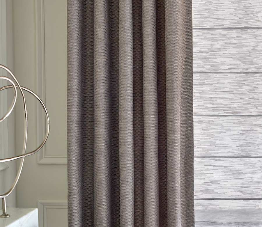 detail of custom fabric drapes in eggplant color Austin, TX