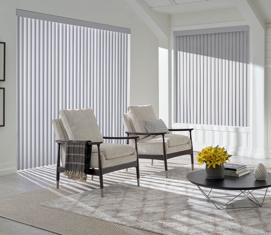 interior of living room space floor to ceiling window and modern armchairs in Austin, TX