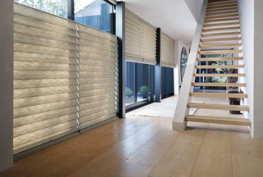 Modern staircase in the hallway with top down/bottom up shades 