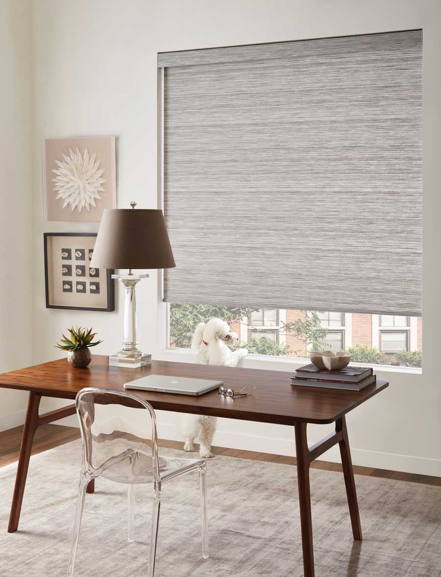 home office with gray woven texture roller shades