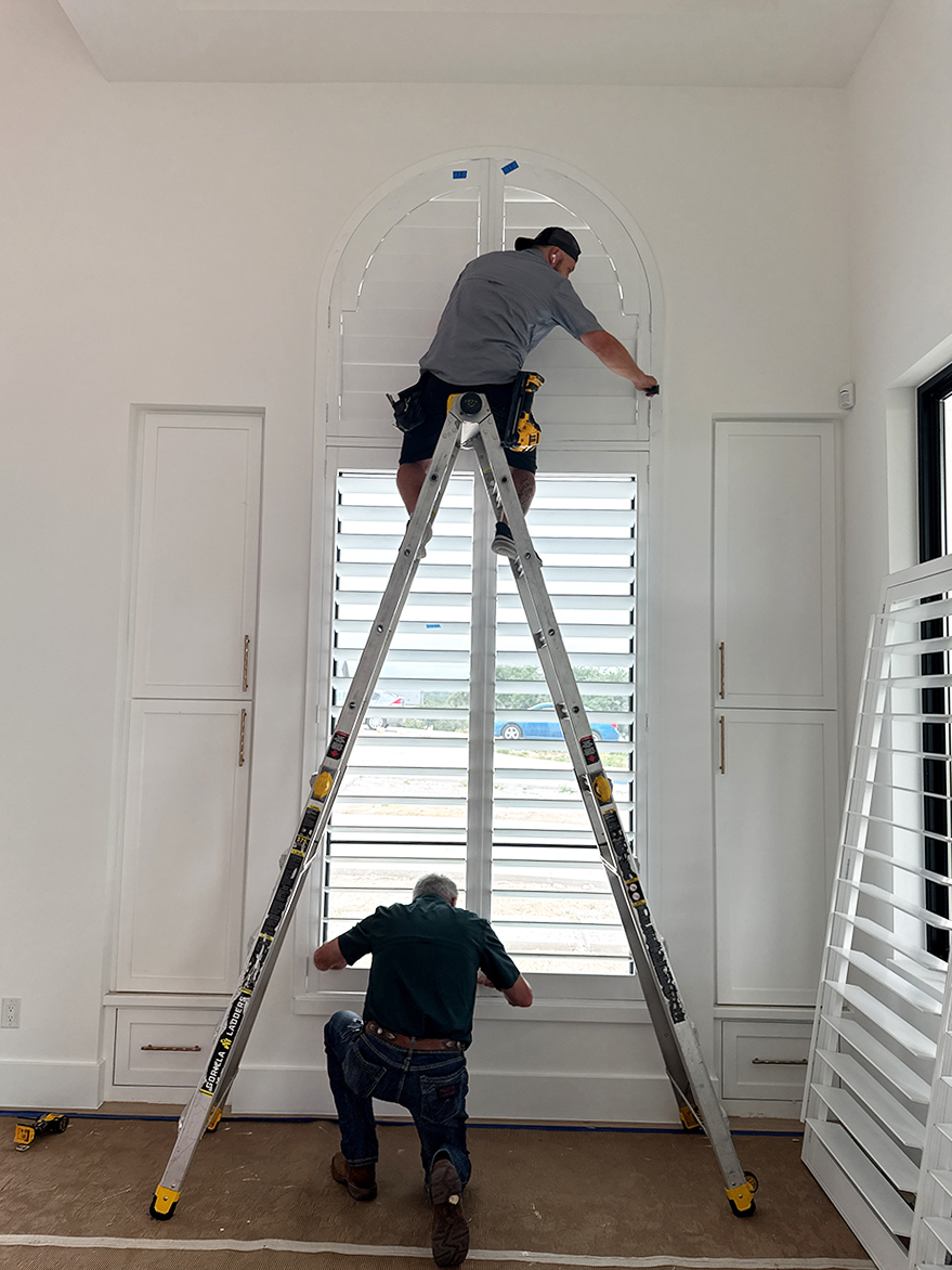 large arched shutter installation in west austin