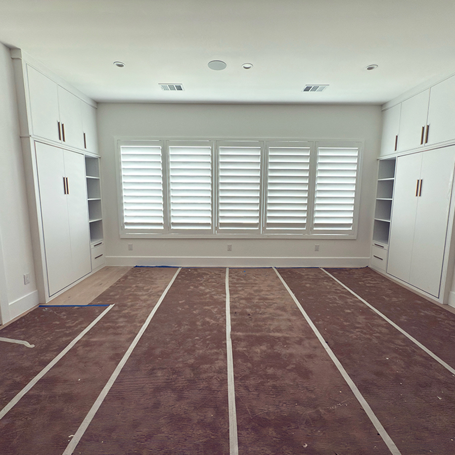 new modern home with white custom shutters