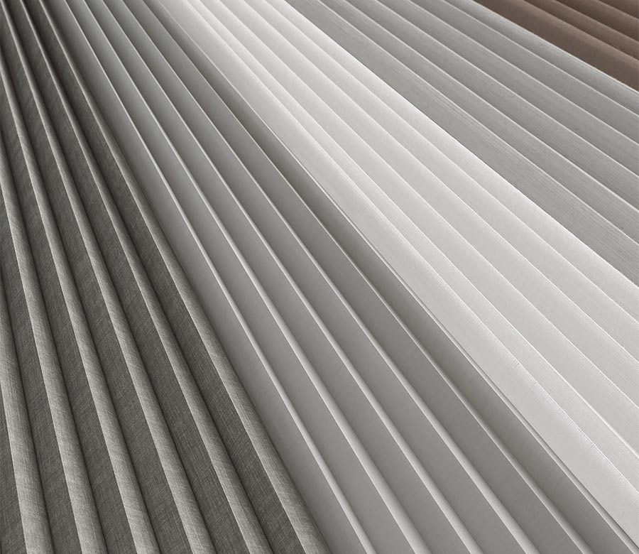 close up of duette vertiglide fabric color options vertical honeycomb shades
