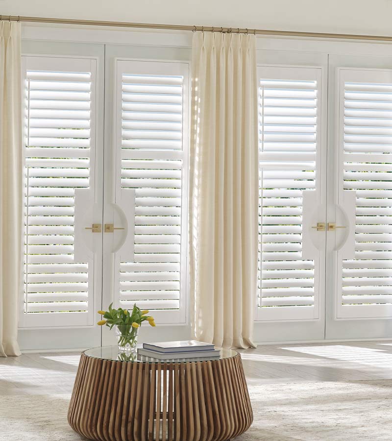 Window Coverings for Sliding Glass Doors white shutters austin