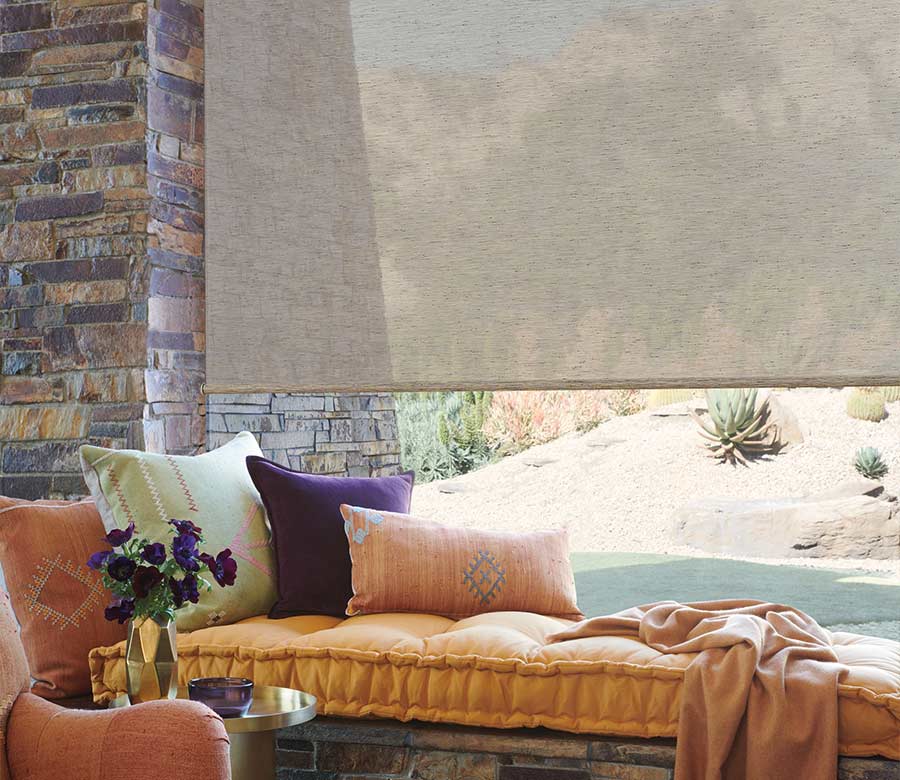 window seat with brown designer roller shades austin window fashions