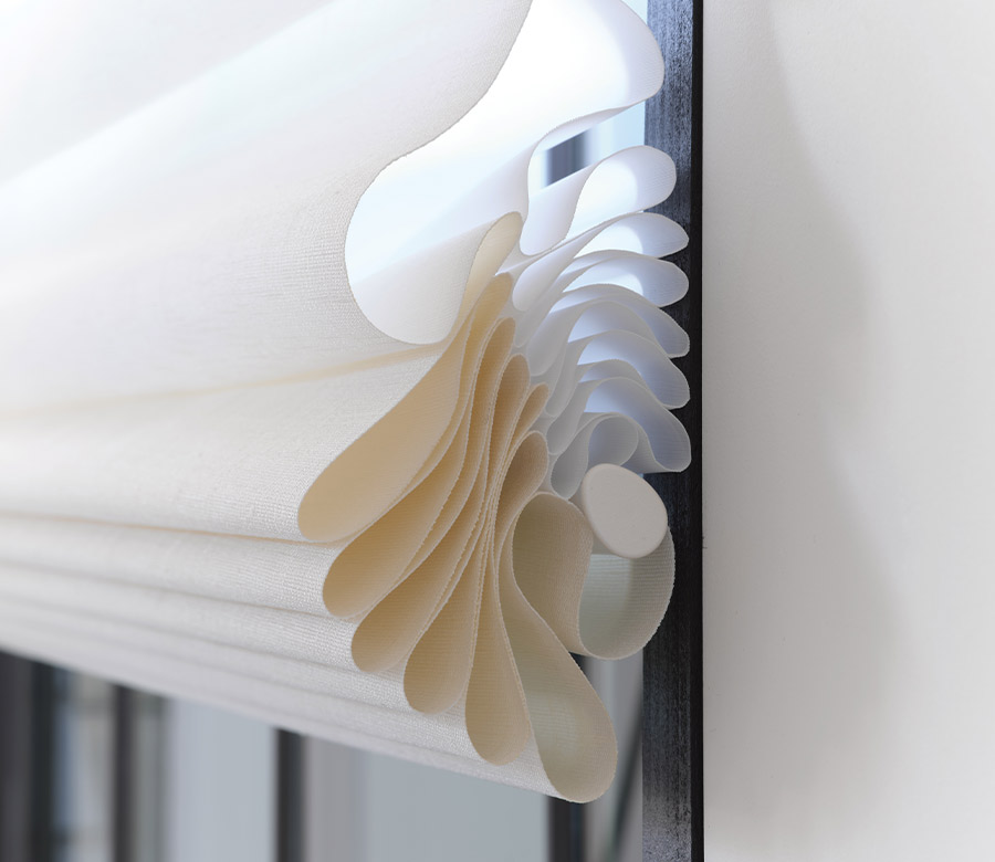 vignette-stacking-detail-roman-shades-hunter-douglas-austin-window-fashions Hunter Douglas Roman shades in soft neutral fabric