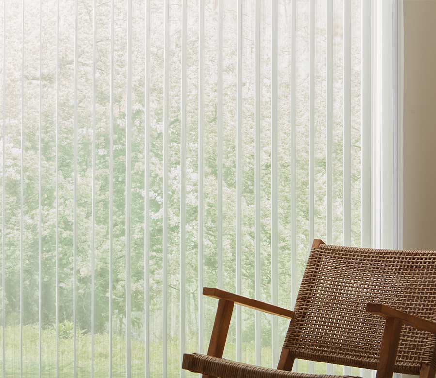 living room with sheer vertical shades