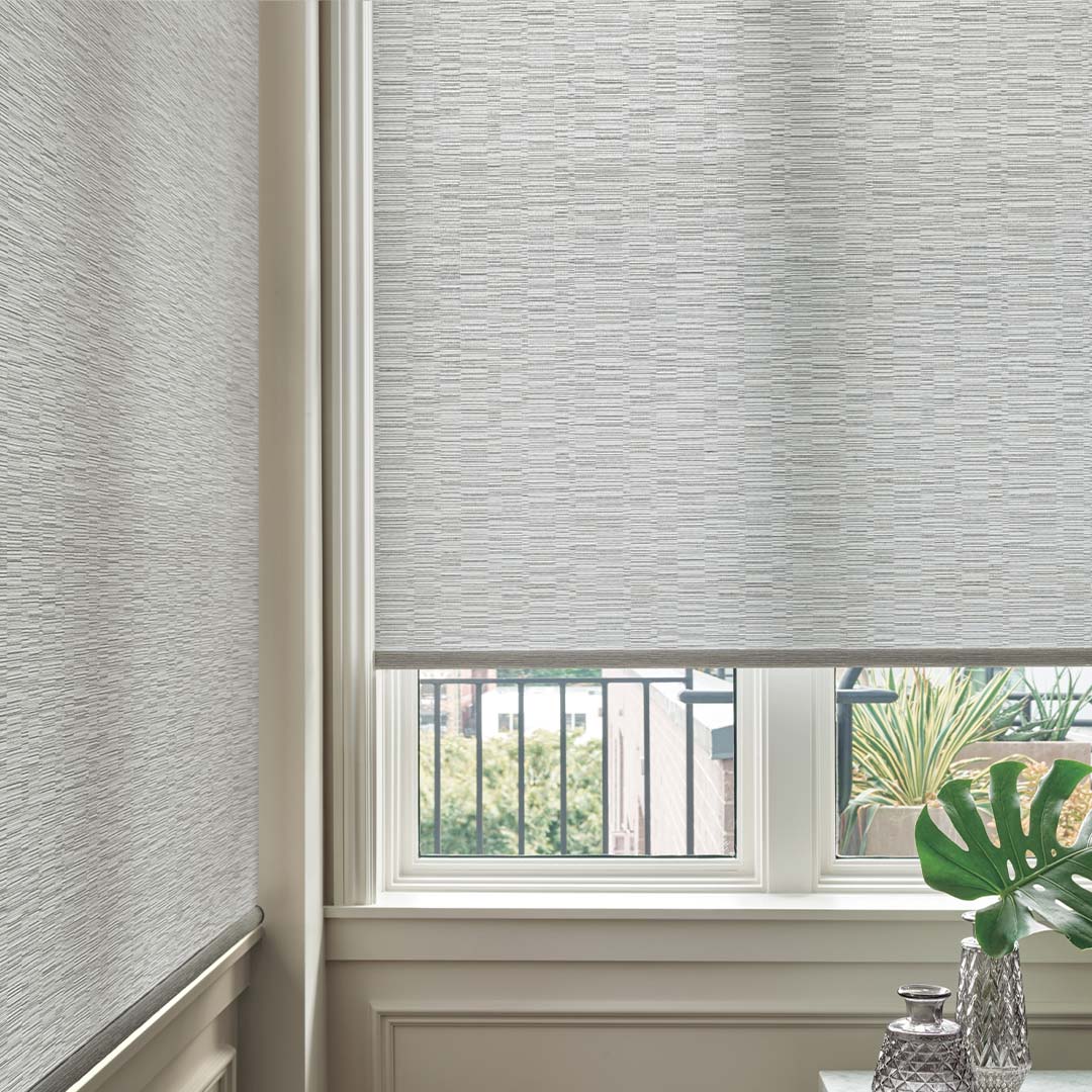 designer-roller-shades-detail-living-room-grey-featured-product-hunter-douglas-austin-window-fashions