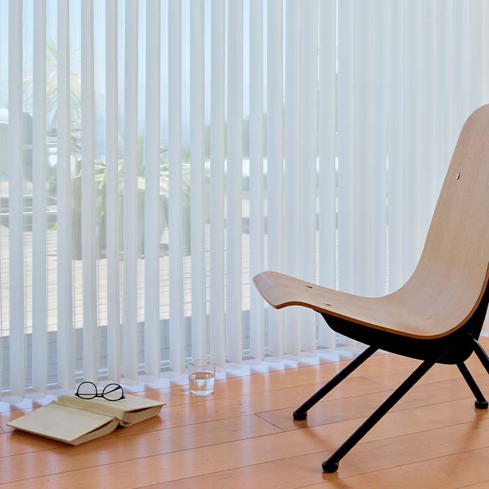 Luminette® Privacy Sheers softly filtering light across large sliding glass doors