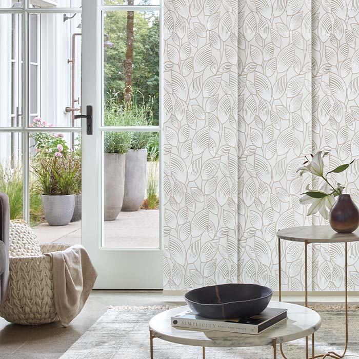 Skyline® gliding window panels on floor-to-ceiling windows in a modern home