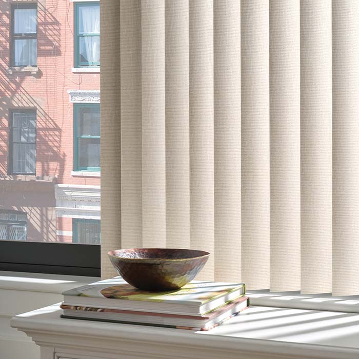 Somner® custom vertical blinds covering wide patio doors in a contemporary living room