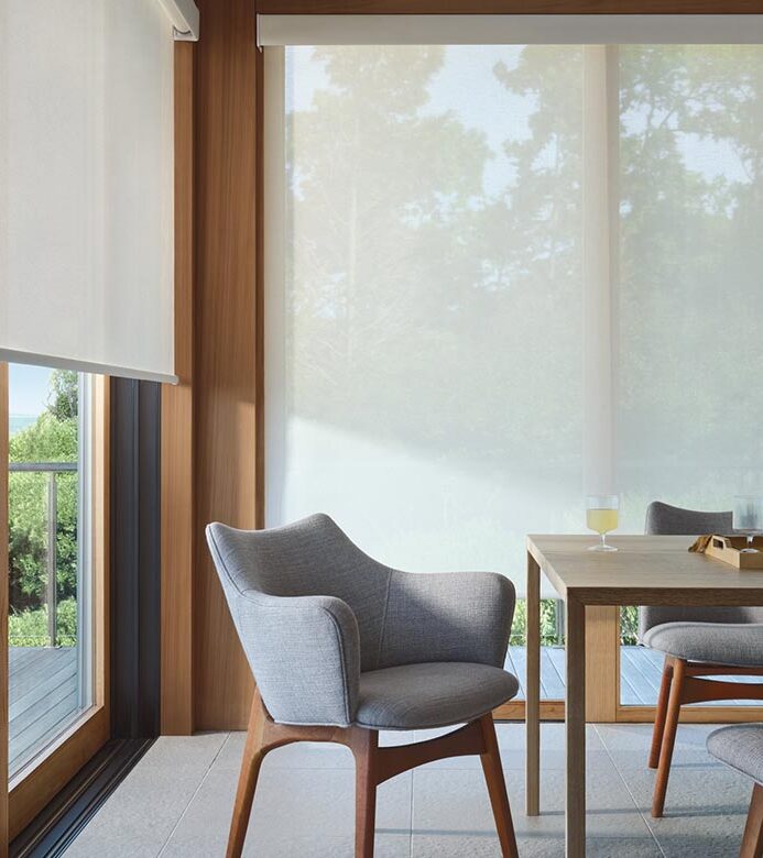 white floor to ceiling screen shades in dining room or privacy