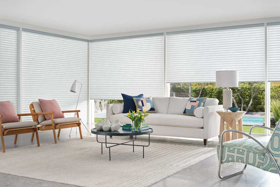 white sonnette motorized shades in living room